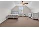 Neutral Bedroom with sloped ceilings, ceiling fan, and large window providing natural light at 120 Whitemarsh Ct., Murrells Inlet, SC 29576