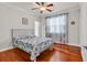 Nautical themed bedroom with hardwood floors, light walls, and plenty of natural light at 120 Whitemarsh Ct., Murrells Inlet, SC 29576