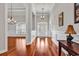 Inviting foyer features hardwood floors, decorative lighting, and a stylish front door at 120 Whitemarsh Ct., Murrells Inlet, SC 29576