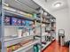 Organized walk-in pantry with ample shelving and storage space at 120 Whitemarsh Ct., Murrells Inlet, SC 29576