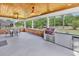 Beautiful covered patio featuring an outdoor kitchen and plenty of space for dining and entertaining at 120 Whitemarsh Ct., Murrells Inlet, SC 29576