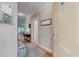 Entry Hall with Hardwood floors, soft neutral paint and trim, decorated with beach themed decor at 128 Puffin Dr. # 1-E, Pawleys Island, SC 29585