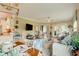 Bright living room with hardwood floors, neutral walls, modern furnishings and decor at 128 Puffin Dr. # 1-E, Pawleys Island, SC 29585