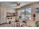 Cozy breakfast nook with a small table, chairs, built-in cabinets, and a window offering natural light at 141 N Gate Rd., Myrtle Beach, SC 29572