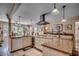 Open kitchen featuring stainless steel appliances, granite countertops, and a convenient wine cooler at 141 N Gate Rd., Myrtle Beach, SC 29572
