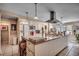 Spacious kitchen with white cabinets, granite countertops, large island, and stainless steel appliances at 141 N Gate Rd., Myrtle Beach, SC 29572