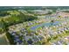 An aerial view of a neighborhood featuring lovely homes around a lake at 1500 Sunmeadow Dr., Conway, SC 29526