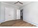 Bedroom with ceiling fan, neutral walls, wood flooring, and closet at 1500 Sunmeadow Dr., Conway, SC 29526