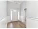Elegant foyer features a chandelier, paneled walls, and hardwood flooring, creating a grand entrance at 1500 Sunmeadow Dr., Conway, SC 29526