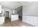 Open-concept living room shows view of kitchen, recessed lighting, and bright finishings at 1500 Sunmeadow Dr., Conway, SC 29526