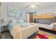 Comfortable bedroom with a full bed, a bunk bed, and ample natural light at 1502 Yaupon Dr. # A-1, Myrtle Beach, SC 29577