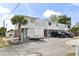 Multi-Gathering unit with two story white exterior and brick trim, and ample parking at 1502 Yaupon Dr. # A-1, Myrtle Beach, SC 29577