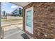 View of front door of a brick building at 1502 Yaupon Dr. # A-1, Myrtle Beach, SC 29577