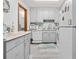 Clean kitchen with grey cabinets and hard surface countertops at 1502 Yaupon Dr. # A-1, Myrtle Beach, SC 29577