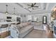 Inviting living room with an open floor plan showcasing the kitchen, dining, and entry areas at 1509 Osage Dr., Myrtle Beach, SC 29579