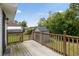 Relaxing view from the wooden deck into the lush backyard at 175 Cypress Ln., Little River, SC 29566