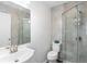 Modern bathroom featuring tiled shower and updated fixtures at 175 Cypress Ln., Little River, SC 29566