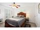 Cozy bedroom featuring a bed with a decorative headboard and ambient bedside lighting at 175 Cypress Ln., Little River, SC 29566
