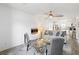 Inviting living room with comfortable seating, fireplace, and ample natural light at 175 Cypress Ln., Little River, SC 29566