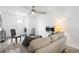 Cozy living space with comfortable furnishings, fireplace, and plenty of natural light at 175 Cypress Ln., Little River, SC 29566