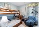 bedroom with bunk beds, nautical decorations, and comfortable seating area at 179 S Reindeer Rd., Surfside Beach, SC 29575