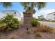 Community brick sign surrounded by landscaping at 179 S Reindeer Rd., Surfside Beach, SC 29575