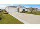 Well-maintained single-Gathering home featuring a manicured lawn, charming landscaping, and a two-car garage in a friendly community at 179 S Reindeer Rd., Surfside Beach, SC 29575