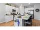 Modern kitchen features white cabinets, stainless steel appliances, and a stylish island with bar seating at 179 S Reindeer Rd., Surfside Beach, SC 29575
