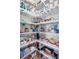Well-organized walk-in pantry with metal shelving, showcasing ample storage space for food and household items at 179 S Reindeer Rd., Surfside Beach, SC 29575