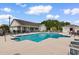 Inviting community pool with ample seating, perfect for summer relaxation and social gatherings at 207 Cupola Dr., Longs, SC 29568
