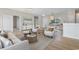 Inviting living room with stylish decor, wood flooring, and ample seating at 207 Cupola Dr., Longs, SC 29568