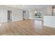 Open and airy living room with wood floors and a bright, welcoming feel at 207 Cupola Dr., Longs, SC 29568