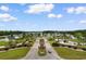 Entryway to this community with charming landscaping, community signs, water features and manicured lawns at 207 Cupola Dr., Longs, SC 29568