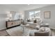 Bright living room with neutral tones, decorative art, and modern furniture creating a comfortable atmosphere at 330 Bayou Loop # Lot 68, Surfside Beach, SC 29575