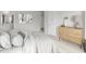 Serene primary bedroom with soft, neutral tones, stylish decor, and ample closet space at 332 Bayou Loop # Lot 69, Surfside Beach, SC 29575