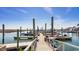 Marina view with boats docked at slips, clear water, and buildings visible along the coast at 332 Bayou Loop # Lot 69, Surfside Beach, SC 29575