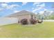 Well-manicured backyard features lush green lawn and a stylish white fence at 349 N Bar Ct., Myrtle Beach, SC 29579