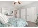 Bright bedroom with vaulted ceilings, a window, and white wooden bed at 349 N Bar Ct., Myrtle Beach, SC 29579