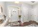 Inviting entryway with hardwood floors, neutral walls, and plenty of natural light at 349 N Bar Ct., Myrtle Beach, SC 29579