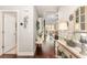 Hallway featuring hardwood floors, neutral walls, and an open view into the living room at 349 N Bar Ct., Myrtle Beach, SC 29579