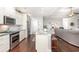 Modern kitchen with granite countertops, stainless steel appliances, an island, and bar seating at 349 N Bar Ct., Myrtle Beach, SC 29579