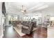 Open-concept living room with hardwood floors, recessed lighting, leading into the modern kitchen at 349 N Bar Ct., Myrtle Beach, SC 29579
