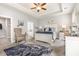 Spacious main bedroom boasts a trey ceiling, stylish decor, and ensuite bathroom access at 349 N Bar Ct., Myrtle Beach, SC 29579