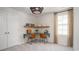 Cozy office space with a built-in desk, shelving, and natural light, perfect for working from home at 378 Ladyfish Loop, Sunset Beach, NC 28468