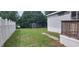 Exterior view of the backyard with an old utility shed and a partial view of the side of a mobile home at 3802 Stern Dr., Conway, SC 29526