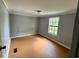 Neutral toned bedroom with a window, laminate floor, and simple design at 3802 Stern Dr., Conway, SC 29526