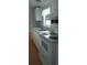 View of kitchen with white cabinetry and appliances against light blue walls and traditional countertops at 3802 Stern Dr., Conway, SC 29526