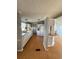 A traditional-style kitchen is shown with white appliances, cabinets, and a simple breakfast bar at 3802 Stern Dr., Conway, SC 29526
