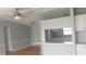 Living room with a ceiling fan and an open kitchen design with a breakfast bar at 3802 Stern Dr., Conway, SC 29526