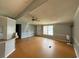 View of the living room featuring neutral colors, laminate flooring, and a ceiling fan at 3802 Stern Dr., Conway, SC 29526